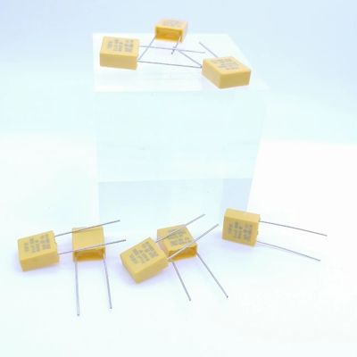 प्रतिरोधक और कैपेसिटिव प्रेशर रिलीफ कैपेसिटर 0.1UF 310V P7.5MM पीला रंग