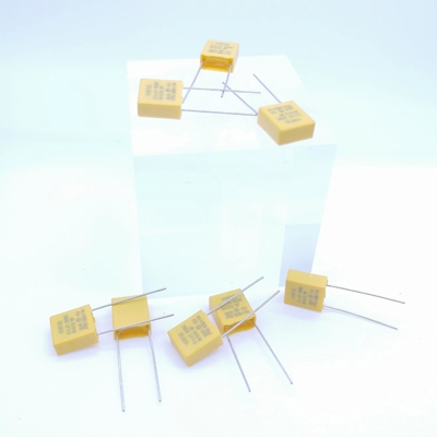 प्रतिरोधक और कैपेसिटिव प्रेशर रिलीफ कैपेसिटर 0.1UF 310V P7.5MM पीला रंग